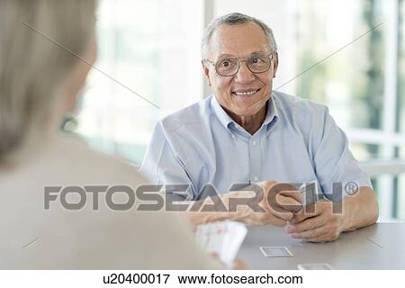 Senior couple playing cards View Large Photo Image Stock Photo - Senior couple playing cards. Fotosearch