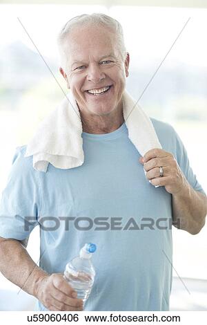 Stock Photograph - Senior man in gym. Fotosearch