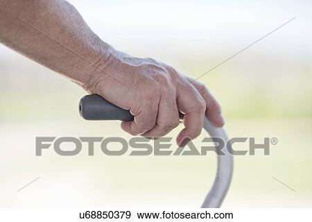 Senior man using walking frame, close up View Large Photo Image Stock Photo - Senior man using walking frame, close up. Fotosearch