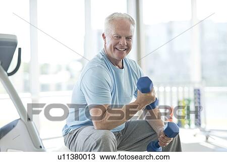Senior man using weights View Large Photo Image Stock Image - Senior man using weights. Fotosearch