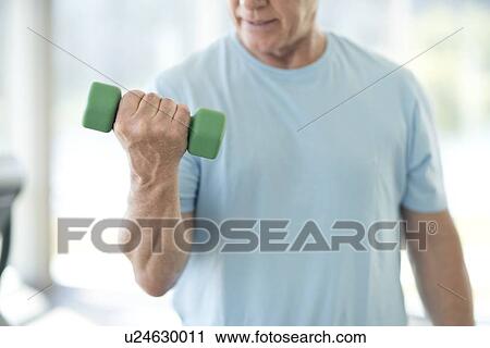 Senior man using weights View Large Photo Image Stock Image - Senior man using weights. Fotosearch