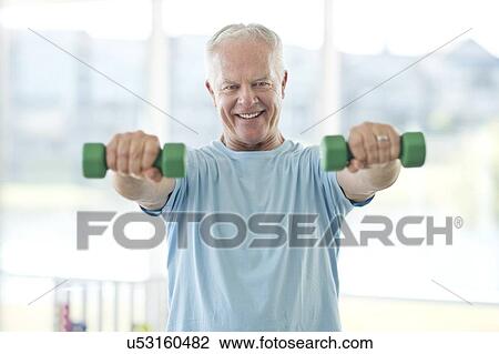 Senior man using weights View Large Photo Image Stock Image - Senior man using weights. Fotosearch