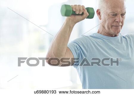 Senior man using weights View Large Photo Image Stock Image - Senior man using weights. Fotosearch