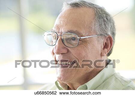 Stock Image - Senior man wearing glasses. Fotosearch