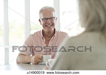 Stock Photo - Senior man with cup of tea. Fotosearch