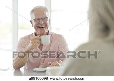 Stock Photo - Senior man with cup of tea. Fotosearch