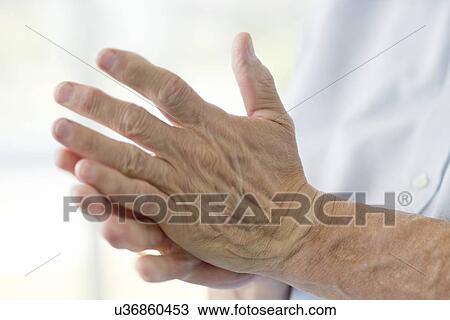 Stock Image - Senior man's hands. Fotosearch