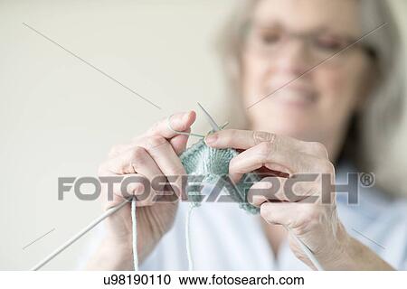 Senior woman knitting View Large Photo Image Stock Image - Senior woman knitting. Fotosearch