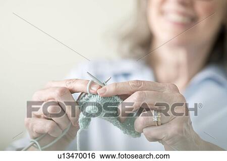 Senior woman knitting View Large Photo Image Stock Photograph - Senior woman knitting. Fotosearch