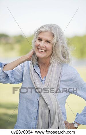 Picture - Senior woman outdoors. Fotosearch