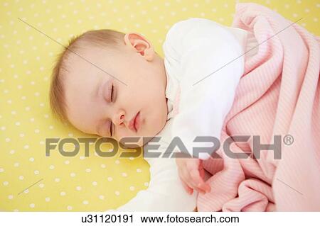 Sleeping baby girl in crib View Large Photo Image Stock Image - Sleeping baby girl in crib. Fotosearch