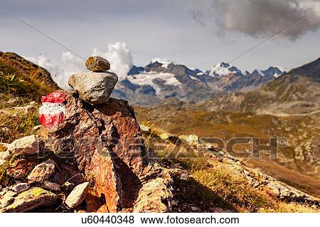 Stack of painted rocks, view of mountains View Large Photo Image Stock Photo - Stack of painted rocks, view of mountains. Fotosearch