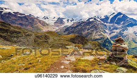 Stock Photo - Stack of rocks in mountains, Santa Caterina Valfurva, Bormio, Italy. Fotosearch