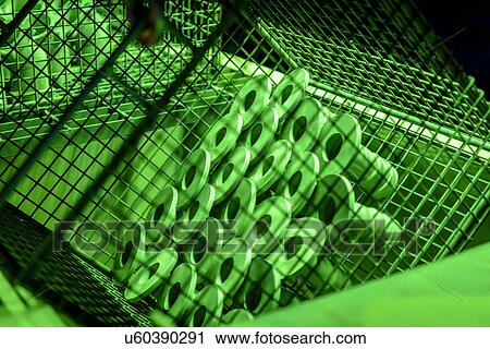 Stock Image - Stained components for crack testing in precision casting factory. Fotosearch