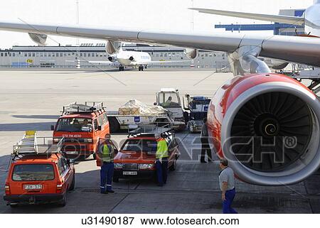 Stationary commercial aeroplane on ground View Large Photo Image Stock Photo - Stationary commercial aeroplane on ground. Fotosearch