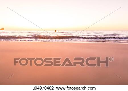 Surface level view of beach and sea at sunset, Nosara, Guanacaste Province, Costa Rica View Large Photo Image Stock Image - Surface level view of beach and sea at sunset, Nosara, Guanacaste Province, Costa Rica. Fotosearch
