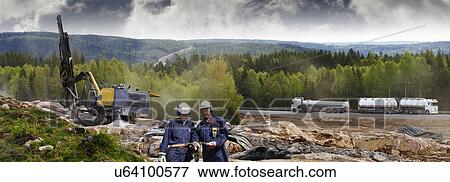 Surveyors on construction site View Large Photo Image Stock Photo - Surveyors on construction site. Fotosearch