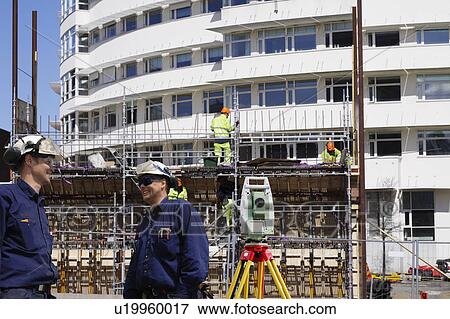 Surveyors on site View Large Photo Image Stock Photo - Surveyors on site. Fotosearch
