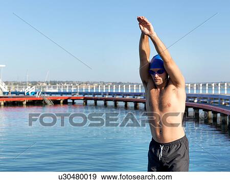 Swimmer diving from boardwalk, Eastern Beach, Geelong, Victoria, Australia View Large Photo Image Stock Photo - Swimmer diving from boardwalk, Eastern Beach, Geelong, Victoria, Australia. Fotosearch