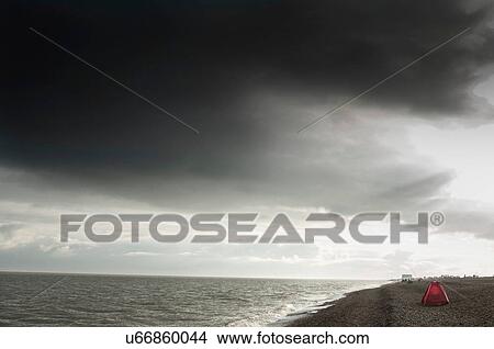 Picture - Tent pitched on beach beside sea, Aldeburgh, Suffolk, England. Fotosearch
