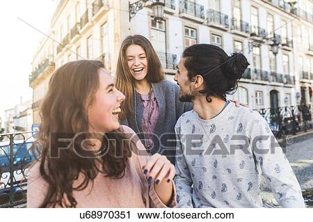 Three friends outdoors, fooling around, laughing, Lisbon, Portugal View Large Photo Image Stock Image - Three friends outdoors, fooling around, laughing, Lisbon, Portugal. Fotosearch