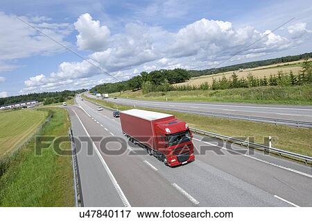 Truck on highway View Large Photo Image Stock Photo - Truck on highway. Fotosearch