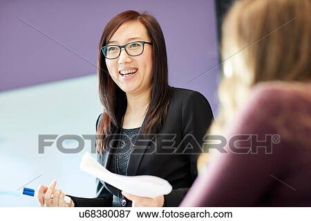 University lecturer and student in class View Large Photo Image Stock Photo - University lecturer and student in class. Fotosearch