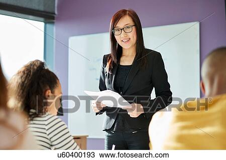 University lecturer and students in class View Large Photo Image Stock Image - University lecturer and students in class. Fotosearch