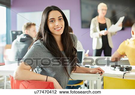 Stock Image - University lecturer and students in class. Fotosearch