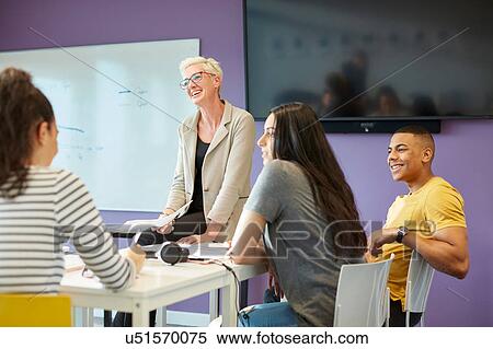 Stock Photography - University lecturer and students in class. Fotosearch