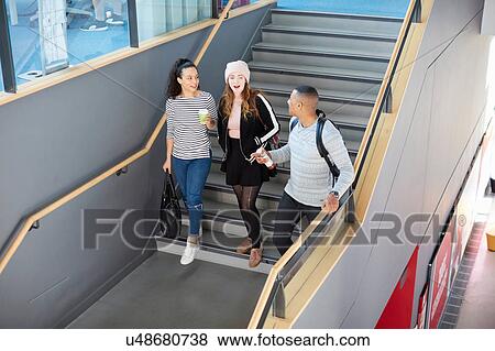 Stock Photo - University students going down stairs. Fotosearch