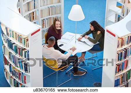 University students working in library View Large Photo Image Stock Photography - University students working in library. Fotosearch