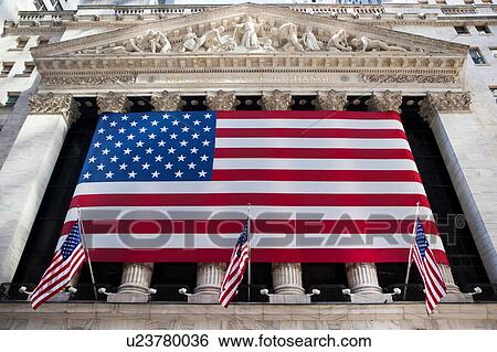 Stock Photograph - View of American flags on the New York Stock Exchange, New York, USA. Fotosearch