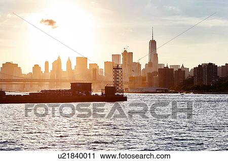 Stock Image - View of East river and One World Trade Centre, New York City, USA. Fotosearch