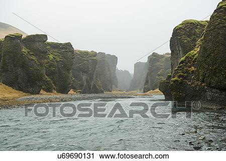 Stock Image - View of river and canyons at Fjadrargljufur, Iceland. Fotosearch