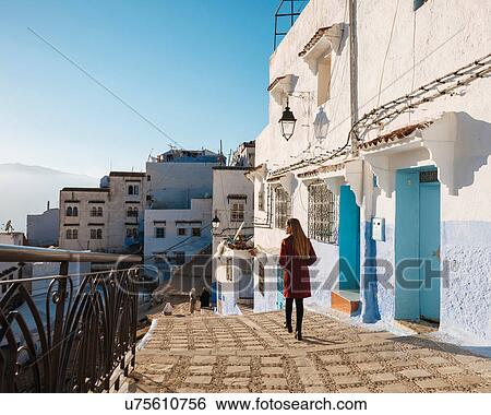 Woman exploring, Chefchaouen, Morocco, North Africa View Large Photo Image Stock Photograph - Woman exploring, Chefchaouen, Morocco, North Africa. Fotosearch