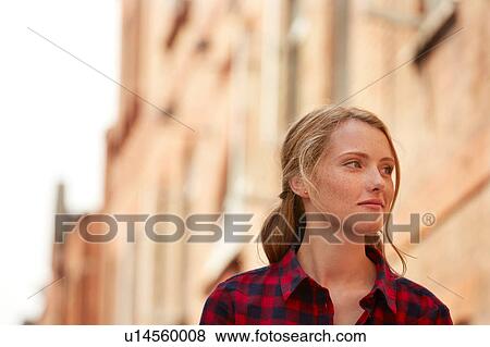 Stock Photo - Woman in street, London, UK. Fotosearch
