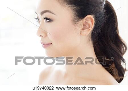 Woman looking away View Large Photo Image Stock Image - Woman looking away. Fotosearch