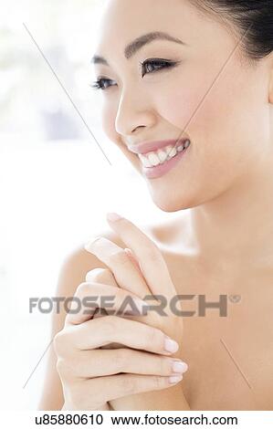 Stock Image - Woman smiling. Fotosearch