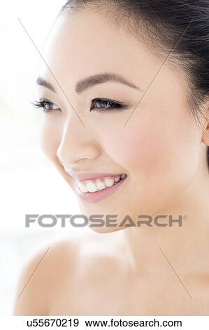 Stock Photo - Woman smiling. Fotosearch