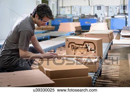 Worker preparing sand mould in precision casting factory View Large Photo Image Stock Photography - Worker preparing sand mould in precision casting factory. Fotosearch