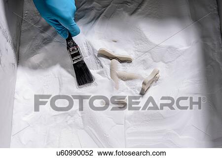 Worker using brush to reveal 3D printed components in precision casting factory, close up View Large Photo Image Stock Image - Worker using brush to reveal 3D printed components in precision casting factory, close up. Fotosearch