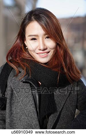 Stock Photo - Young woman, Milan, Italy. Fotosearch
