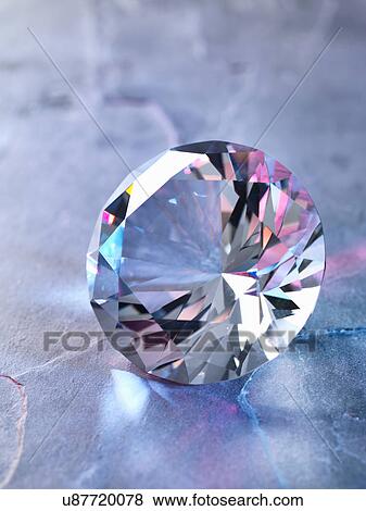Stock Photo - Diamond on piece of granite, close-up. Fotosearch