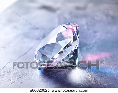 Stock Photography - Diamond on piece of granite, close-up. Fotosearch