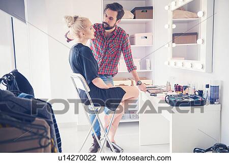 Male make up artist and model getting ready for photo shoot View Large Photo Image Stock Image - Male make up artist and model getting ready for photo shoot. Fotosearch
