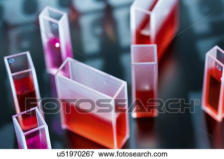 Stock Photo - Cuvette containing red liquid.. Fotosearch