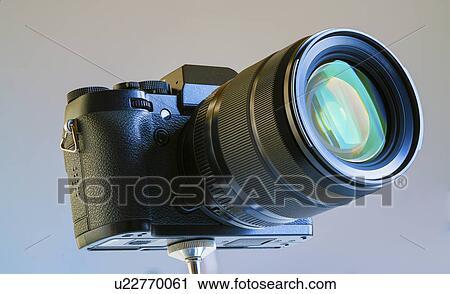 Stock Image - Digital single lens reflex camera.. Fotosearch