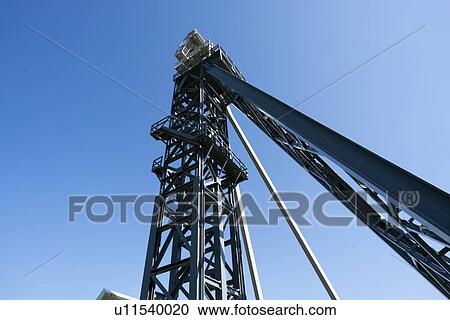 Drilling rig against a clear blue sky. View Large Photo Image Stock Image - Drilling rig against a clear blue sky.. Fotosearch