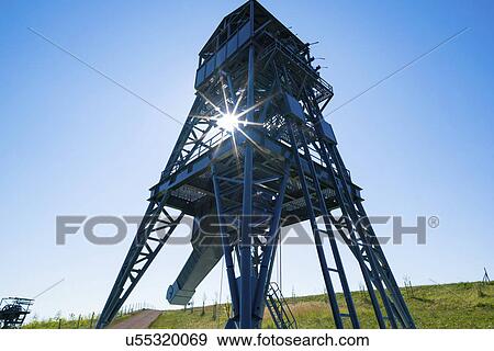 Stock Photo - Drilling rig against a clear blue sky.. Fotosearch